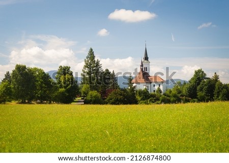 Mountain landscape with a small village church as marvelous view with blue sky, Malenovice, Moravian-Silesian Beskydy. Czech Republic.