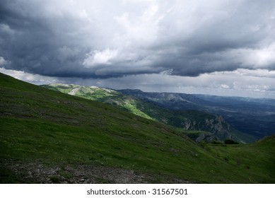 Mountain landscape with storm-clouds.