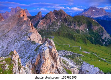 Mountain landscape with summits and valley after sunset, Dolomite Alps, Italy