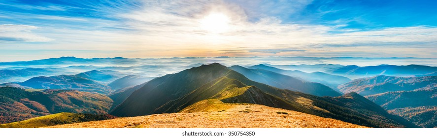 Mountain landscape at sunset. Panorama of beautiful view on hills