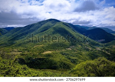 Mountain Landscape Under Bright Clouds (Hierve el Agua, Mexico)