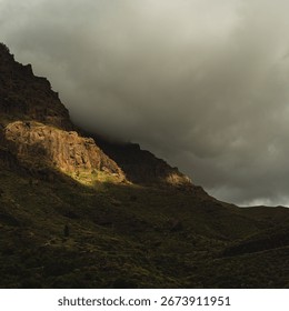 Mountain Landscape Under Dramatic Clouds