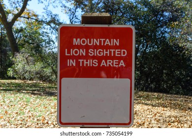 Mountain Lion Warning Sign In Mountain Hiking Area