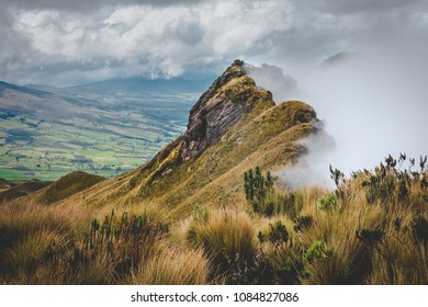 Mountain with mist at its summit