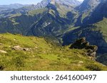 Mountain panorama with mountain inn Auberge du Pont-de-Nant in Swiss Alps, Switzerland