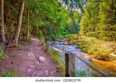 Mountain path beside Kamienna river. Karkonosze National Park.