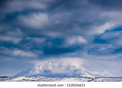 Mountain peak in clouds