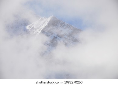 Mountain peak in the clouds.
