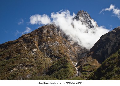 Mountain peak in the clouds
