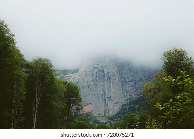 Mountain Peak in Clouds