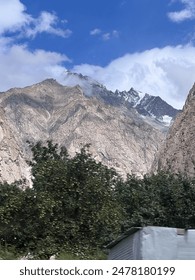 Mountain peak covers with clouds