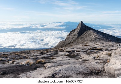 Mountain Peak Over Clouds On Kota Kinabalu Mountain In Malaysia