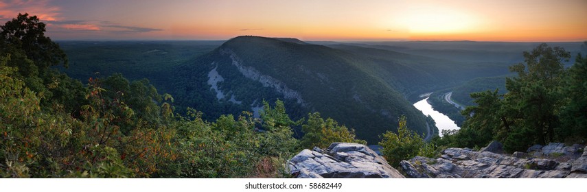 Mountain peak view panorama at dusk with river and trees from Delaware Water Gap, Pennsylvania.