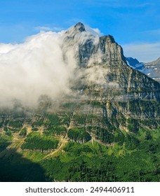 Mountain Peak Wrapped In Clouds