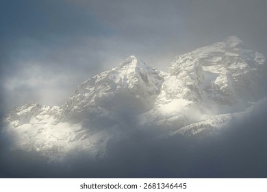 mountain peaks in the cloud