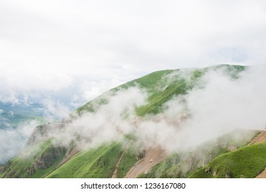 Mountain peaks in the clouds