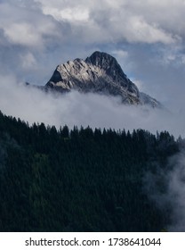 mountain peaks in the clouds