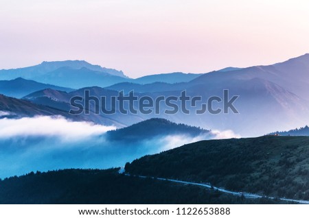 mountain peaks in morning fog - foggy morning over Wutai mountains in Shanxi, China