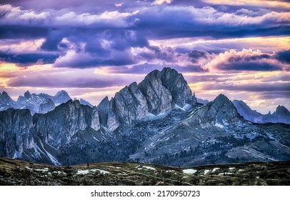 Mountain peaks and ridge under the clouds. Mountain ridge landscape. Dark clouds in mountain sky. Mountain sky clouds