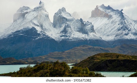 Mountain peaks of Torres del Paine in Patagonia National Park Chile, peaks covered in fog.  - Shutterstock ID 1931671382