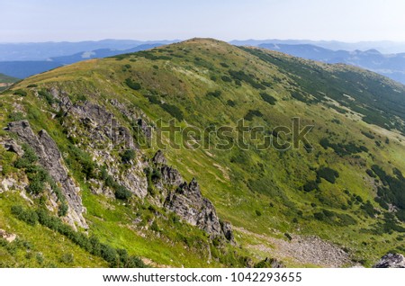 A mountain range with cliffs.