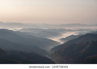 mountain range in the clouds