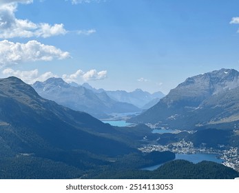 Mountain range with clouds and blue sky