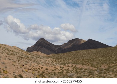 Mountain Range With Clouds And Desert
