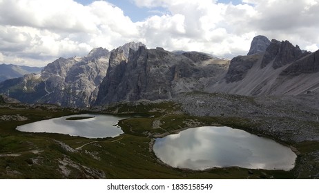 Mountain range with lakes and clouds