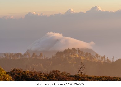 Mountain range landscape and cloud over peak in the morning