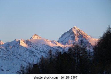 mountain range in red sunset light
