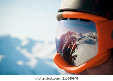 A mountain range reflected in the ski mask