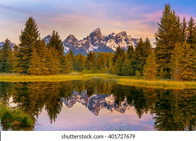 A Mountain Range with Its Reflection, Grand Teton National Park, USA.  Landscape is unique and part of Rocky Mountain. Grand Teton National Park is also popular among landscape and nature photographer - Shutterstock ID 401727679
