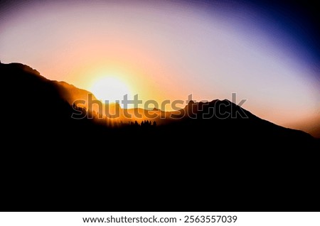 Similar – Image, Stock Photo Mountain range in deep sunset red