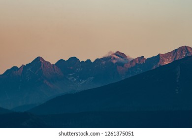 mountain range at sunset