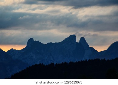 a mountain range in sunset light