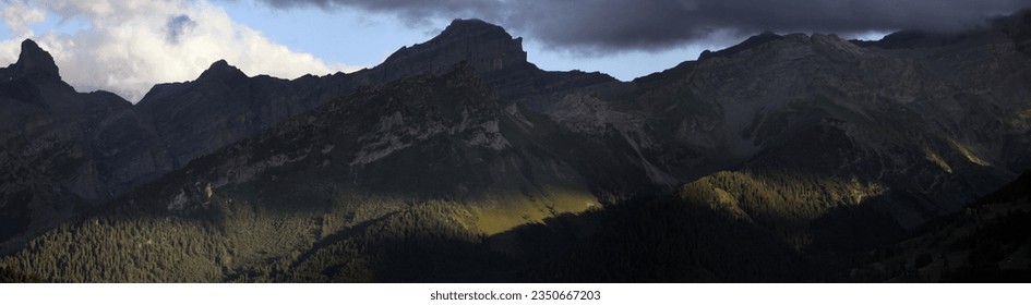 a mountain range in sunset light
