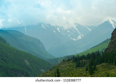 Mountain range under clouds. Rocks for Hiking and tourism