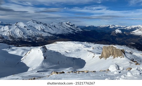 Mountain range in winter with ski slops
