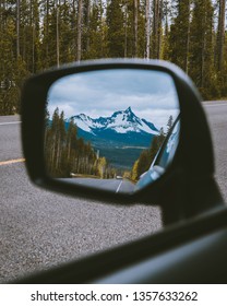 Mountain Reflection in Car Mirror