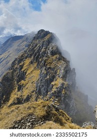 Mountain ridge in the clouds 