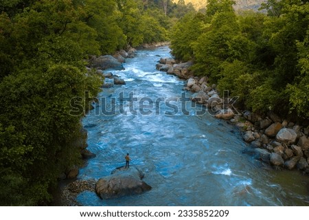 Mountain river in the forest. Tons River tributary of the Yamuna. It flows through the Garhwal region, Hanol, in Uttarakhand, India.