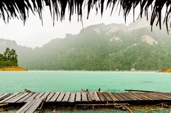 Mountain And River Front Of The Hut While It Was Raining In Ratchaprapha Dam At Khao Sok National Park, Surat Thani Province, Thailand
