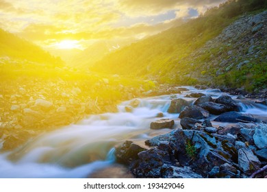 mountain river at the sunset - Shutterstock ID 193429046