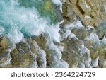Mountain river surface, natural water background, aerial view. Fast pure flow stream.