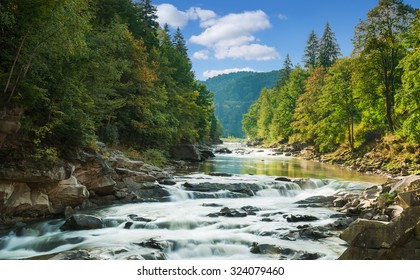mountain river with waterfall