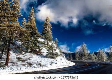 A Mountain Road Carving Through The Snow Covered Slopes Above Lake Tahoe. This Is The Mount Rose Highway, Heading Towards The Mount Rose Ski Resort In Nevada.