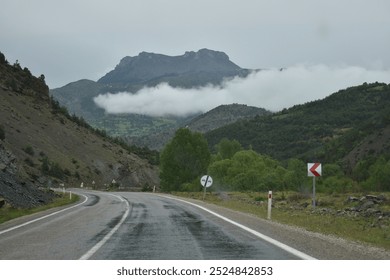 Mountain road in the clouds