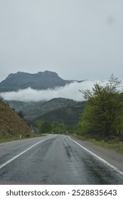 Mountain road in the clouds