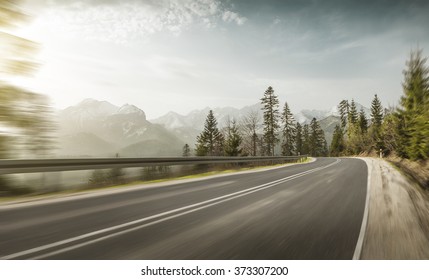 Mountain road at hight speed drive downhill